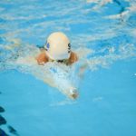 Child swimming in a pool