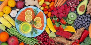 fruits, vegetables, lemon slices, salmon