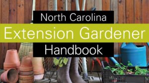 An image of the Extension Gardner's Handbook cover picture of materials used for gardening, including a watering can, rake, broom, garden boots, pots and plants, are collected together.