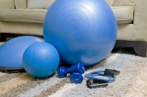 exercise balls and weights in a home setting