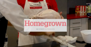 video thumbnail of a cook's apron and hands holding a turkey