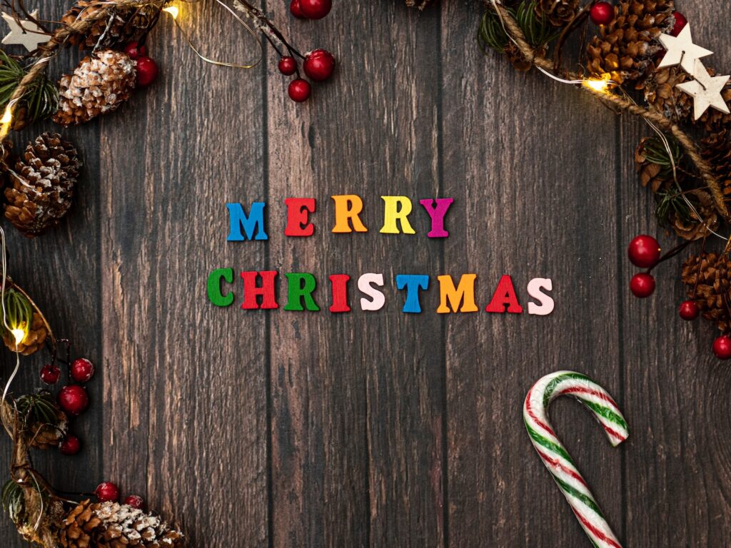 Merry Christmas poster on wood grain background