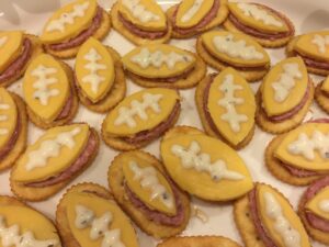 football-shaped meat, cheese and crackers appetizer