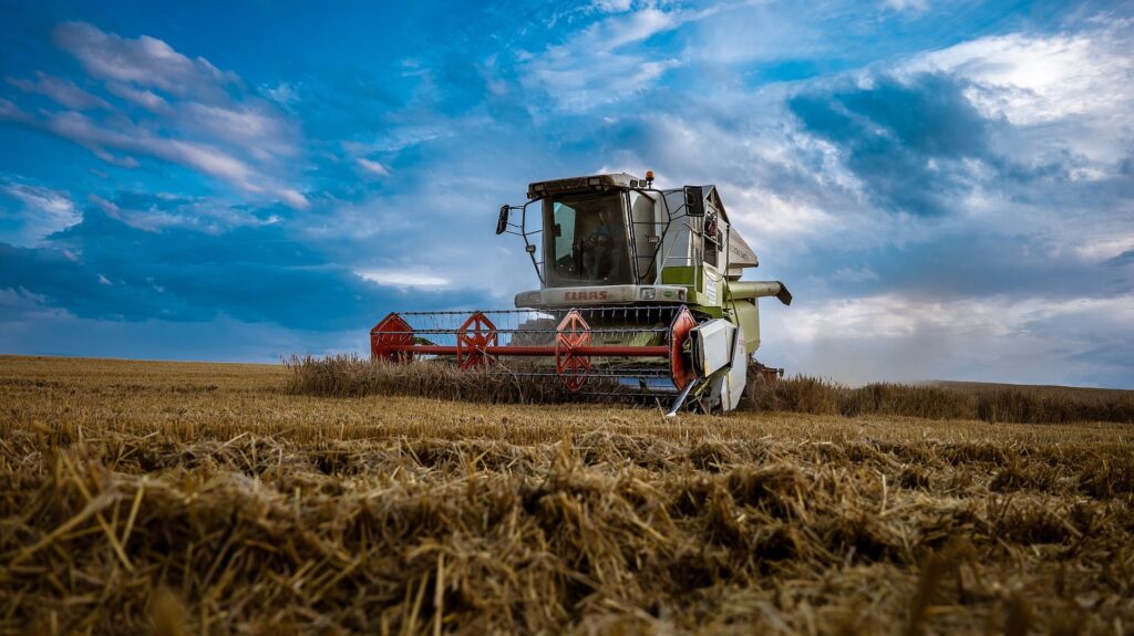 tractor harvesting hay